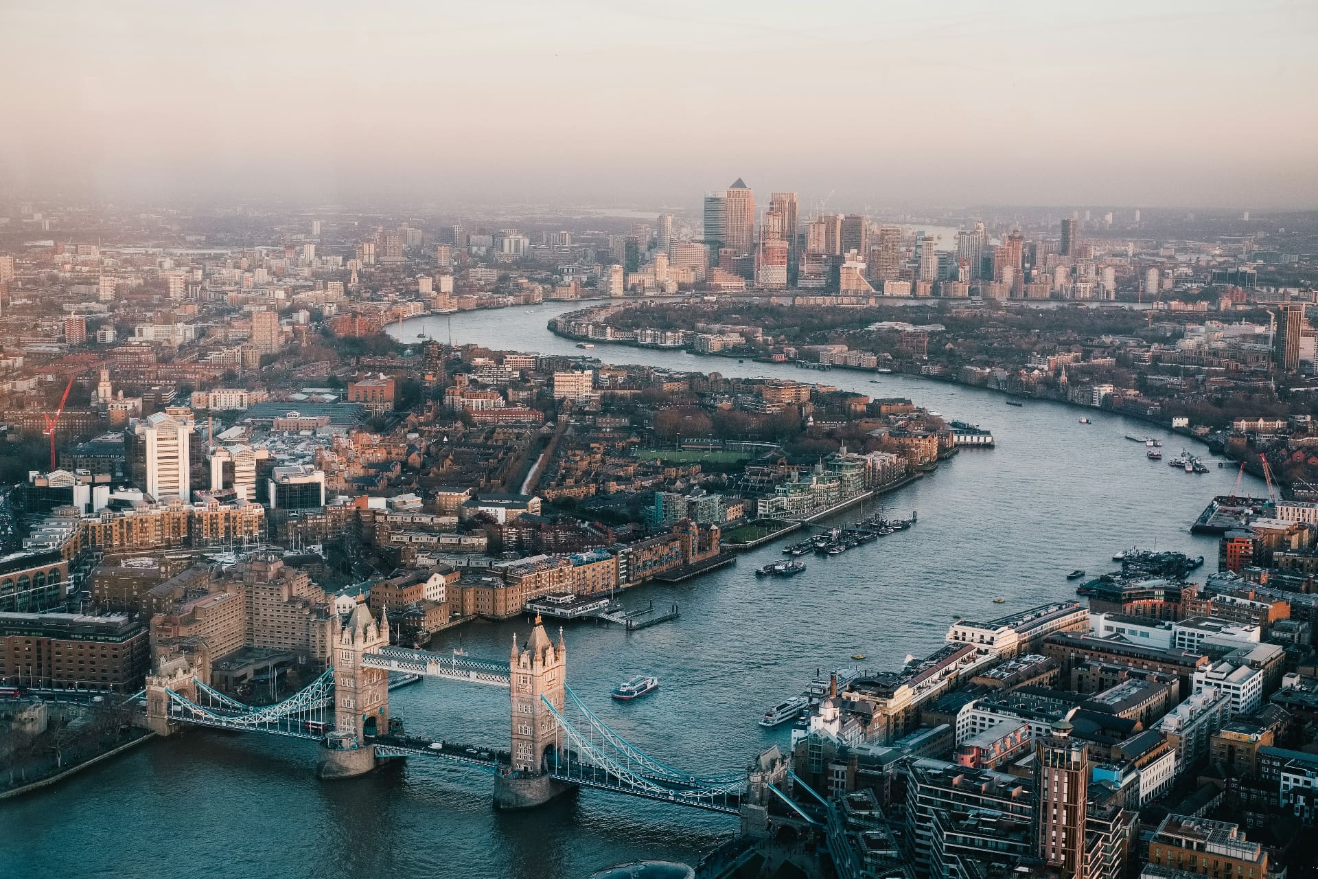 Aerial view of Tower Bridge and the Thames at sunset — social media agency in London
